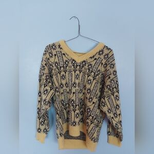 Yellow and Black Crew Neck Sweater with Striking Patterns